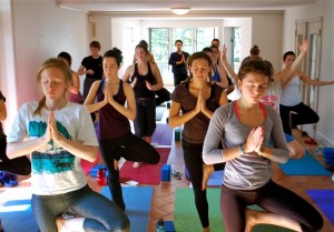 Students practicing yoga