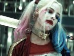 Harley Quinn, one of many women in comics, holding a bat.