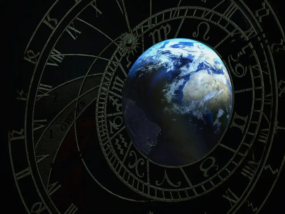Earth surrounded by zodiac and tarot symbols