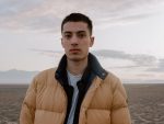 EDM musician EDEN, on the beach.