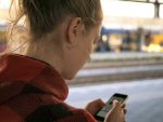 Girl looking at social media on her phone