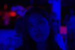 Describing stigma surrounding Asian-American women, many of these women can be left in the dark when it comes to body positivity in a tug-of-war between their two cultures much like the woman pictured above in a dark scene with little light.