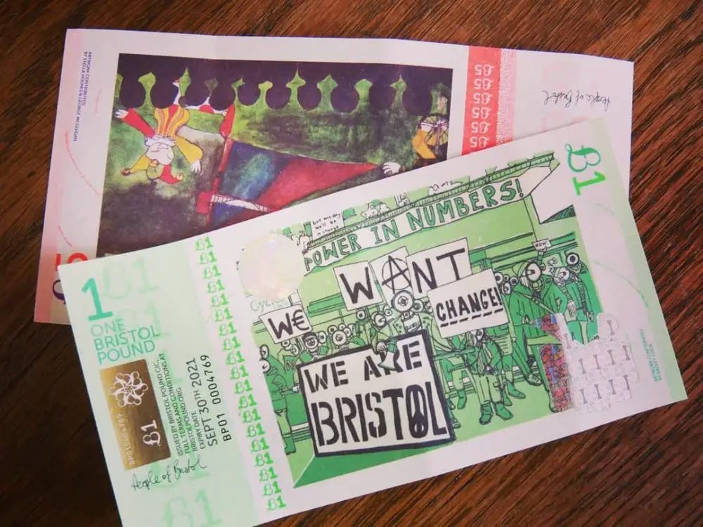 two Bristol pound notes, an example of complementary currency