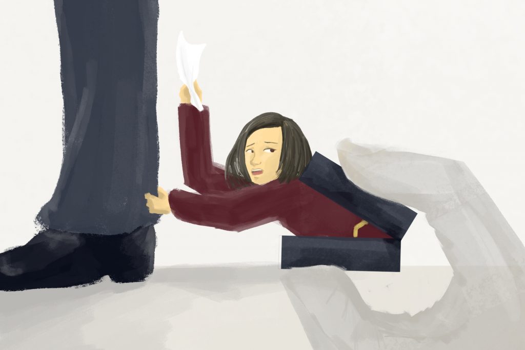 A woman at the foot of a man in an article about female entrepreneurs