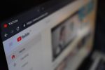 Photo of a computer screen with the channel of a YouTube creator