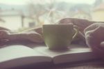 cup of coffee in article about needing to stay positive in quarantine