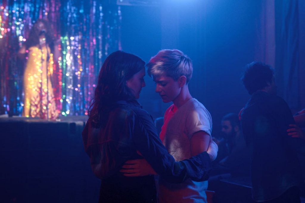 Mae and George dance together in a scene from Feel Good