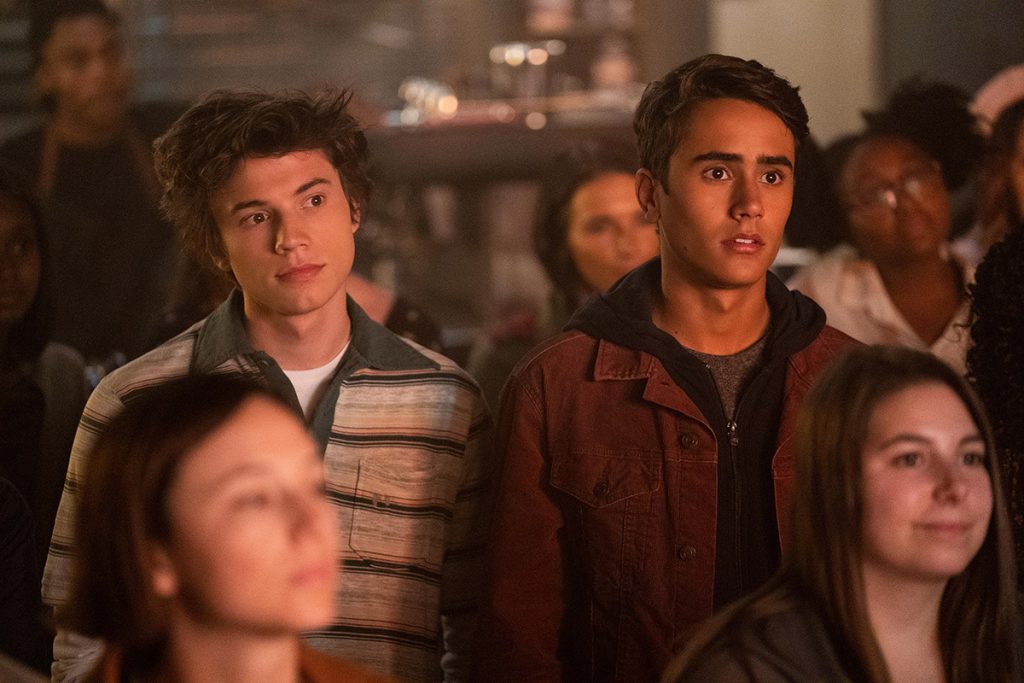 Characters from Love, Victor standing in a crowd