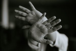 In an article about emetophobia, two open hands