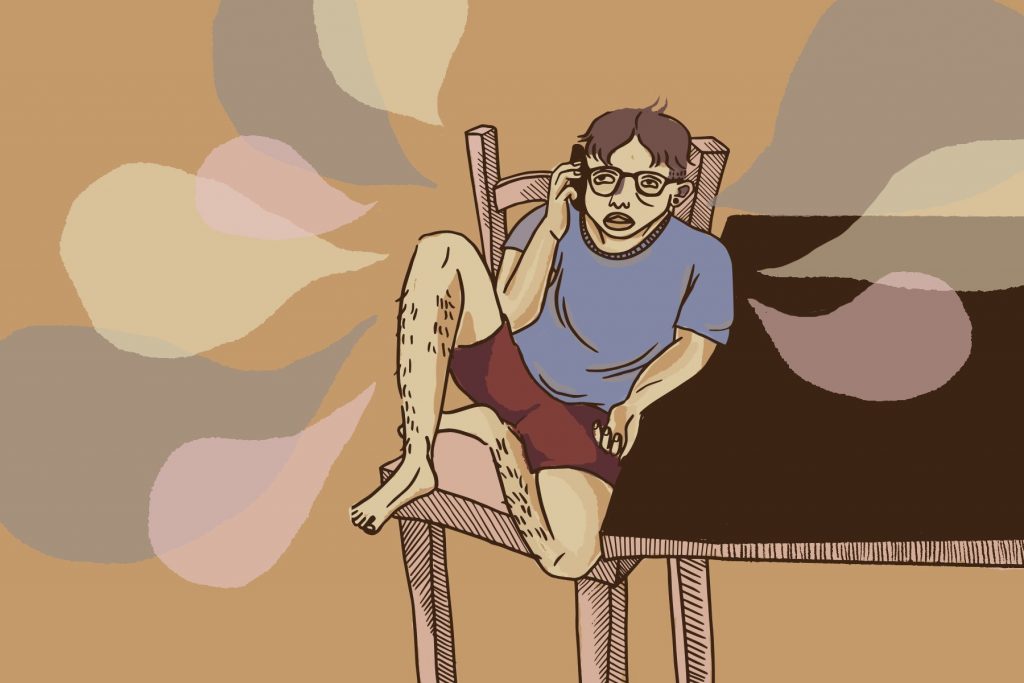 Man talks to his therapist over the phone.