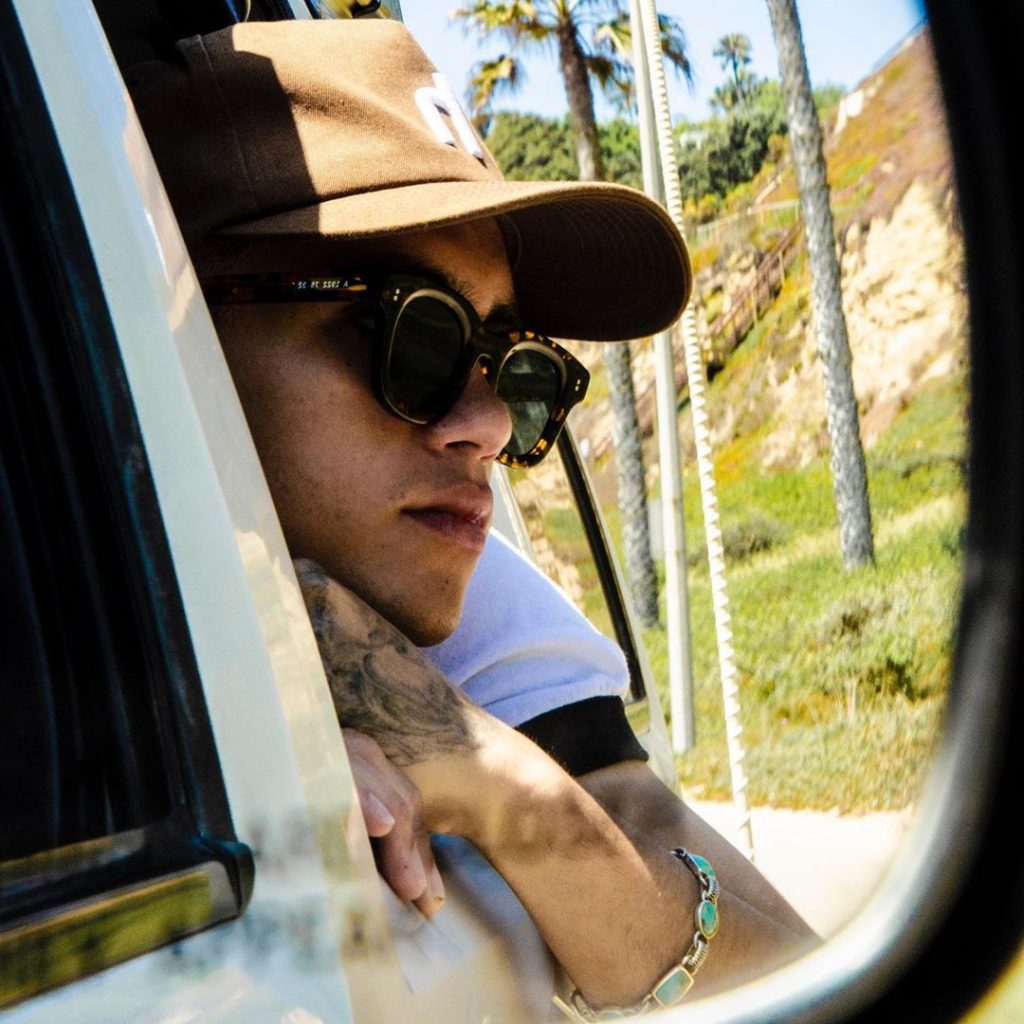In an article about his album What Could Possibly Go Wrong, a photo of Dominic Fike leaning out a car window