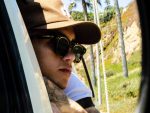 In an article about his album What Could Possibly Go Wrong, a photo of Dominic Fike leaning out a car window