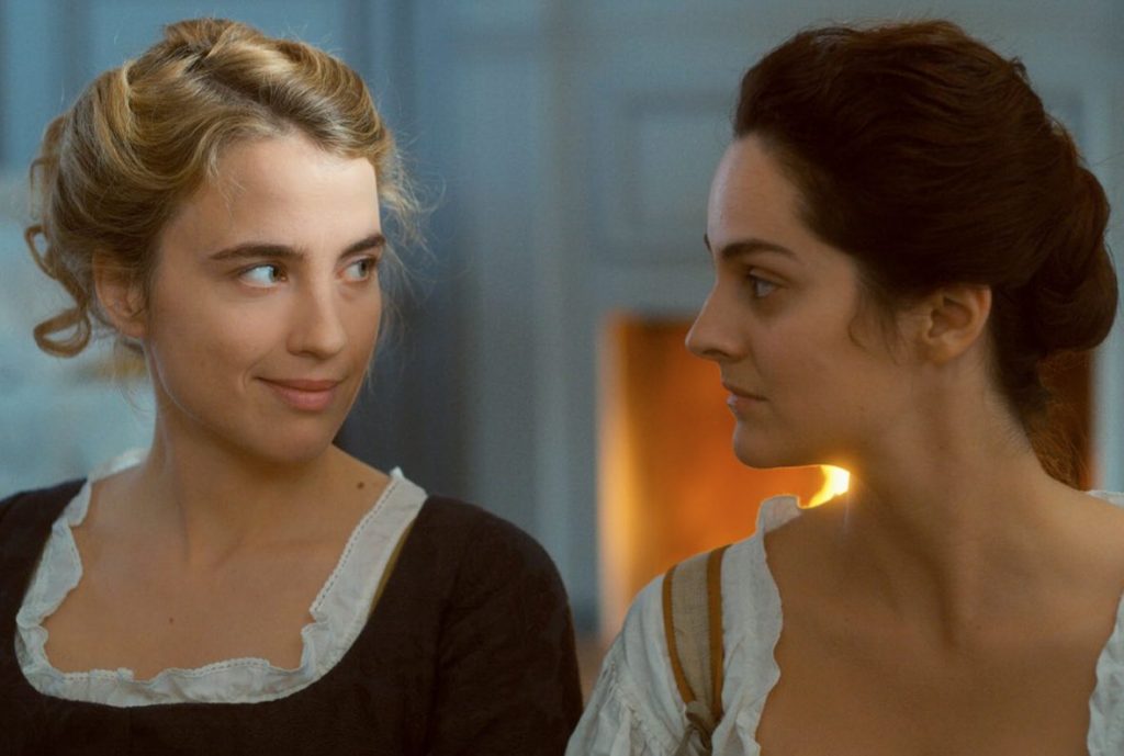 In a list of LGBTQ+ movies, a photo from Portrait of a Lady on Fire