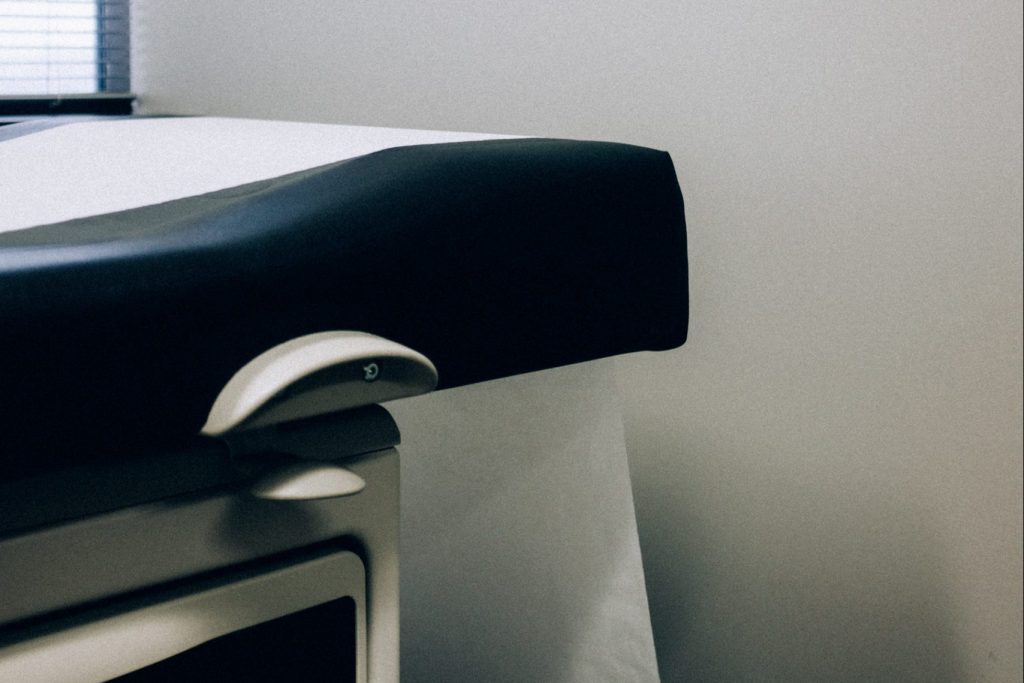 In an article about plastic surgery, a exam table