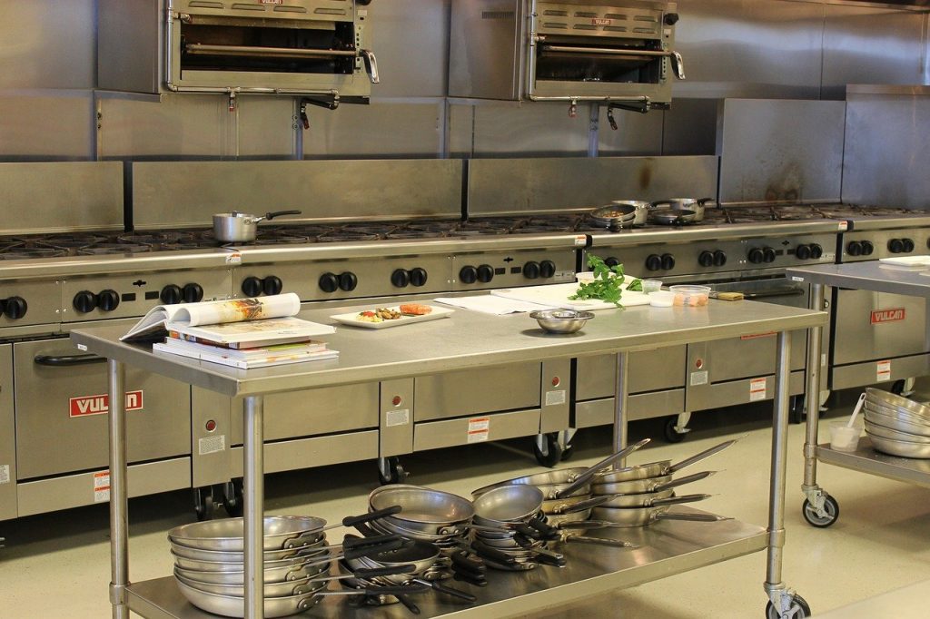 Image of a commercial kitchen in an article about ghost kitchens.