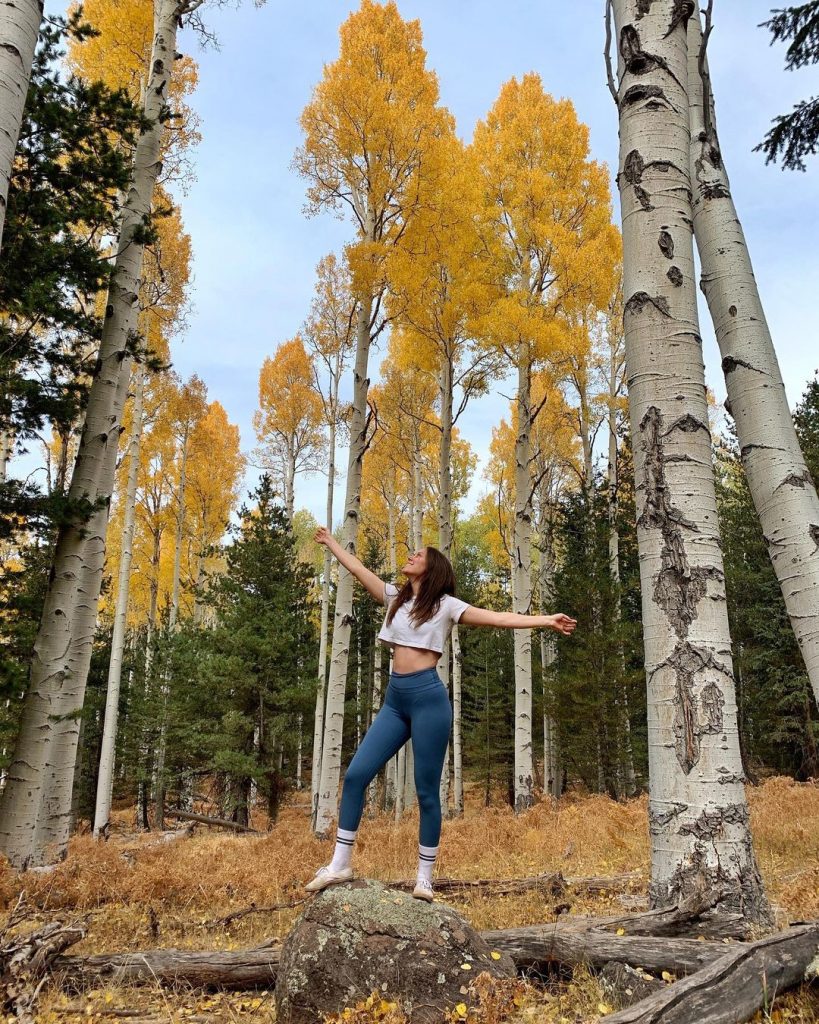 In an article about healthy lifestyle YouTubers, an image of FrumpyFit's Layna