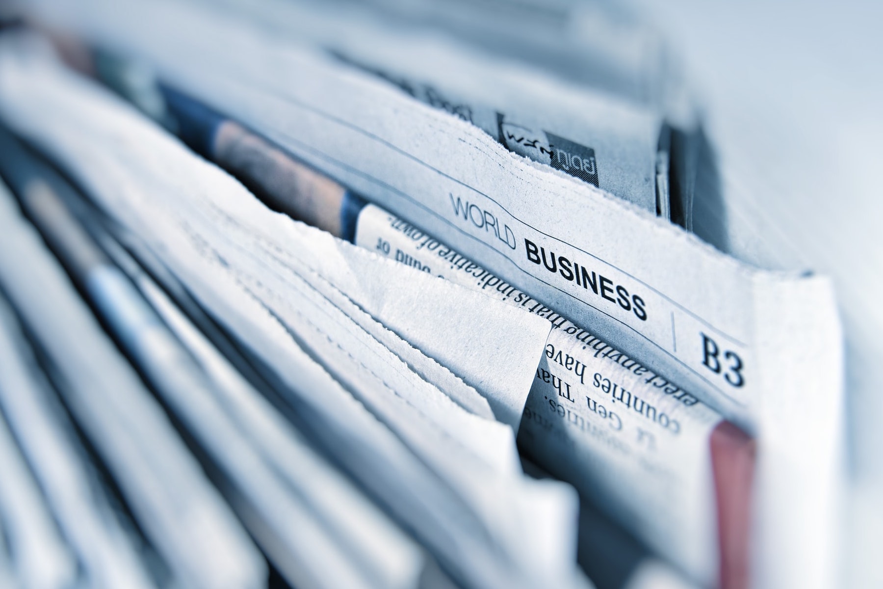 Image of a newspaper for an article about the benefits of startup accelerators. (Photo by AbsolutVision from Unsplash)