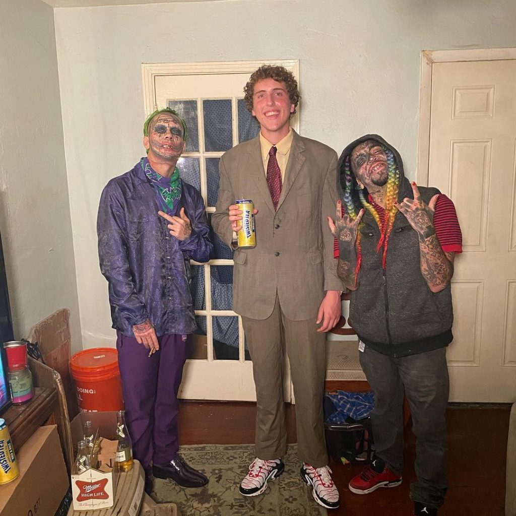Andrew Callaghan with two other people