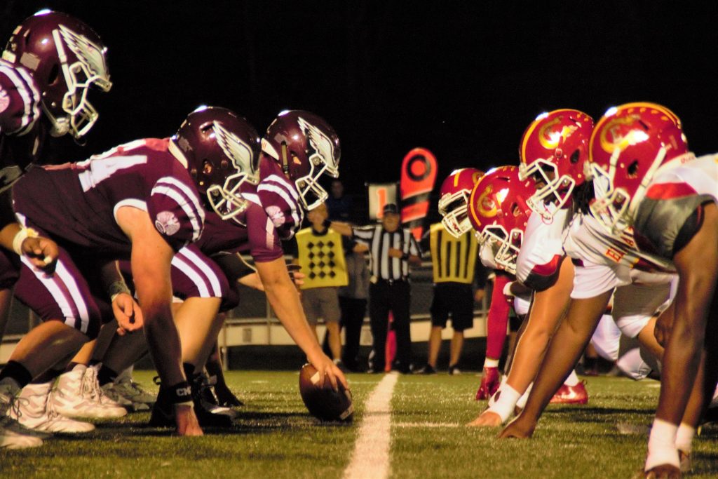in an article about student-athletes, the beginning of a football game