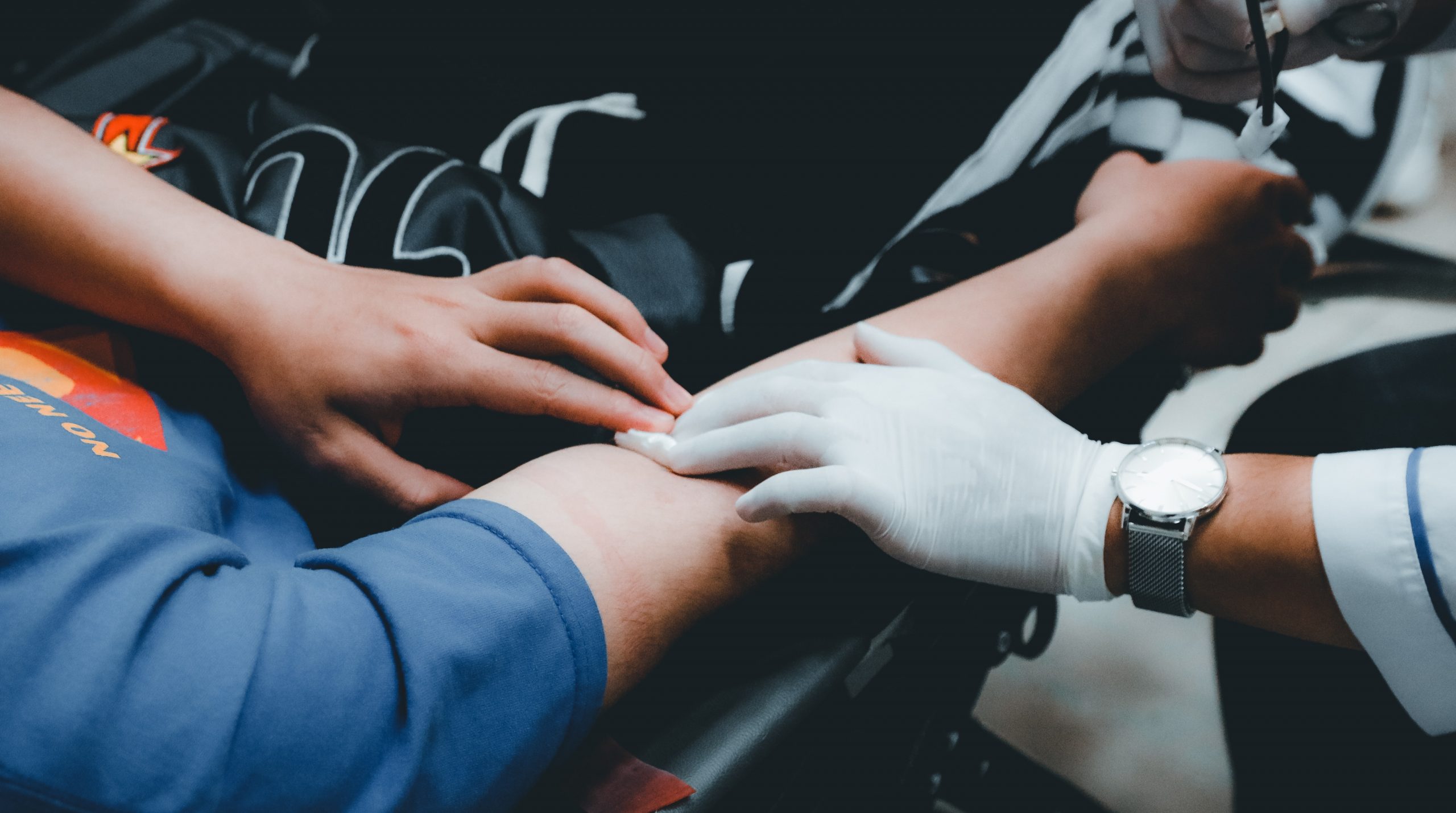 in an article about bloodborne pathogens, blood being drawn