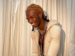 Lancey Foux smiling during a personal photo shoot