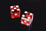 two dice in an article about minimum deposit casinos