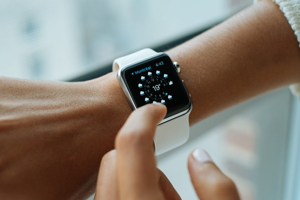 person wearing Apple watch