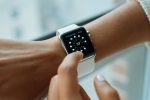person wearing Apple watch