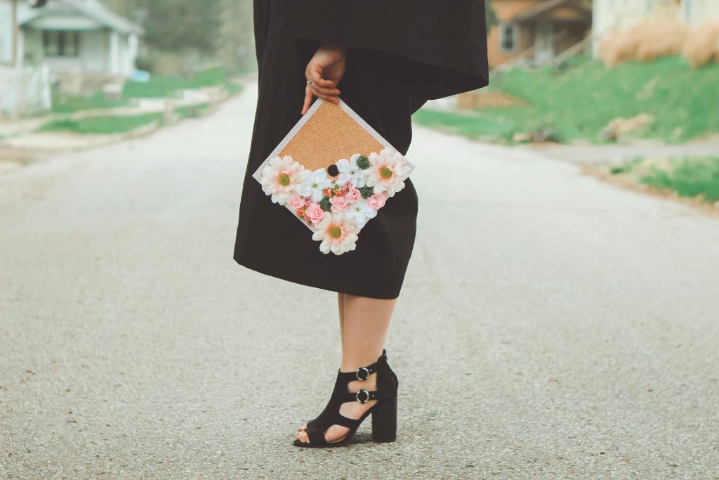 in an article about getting your degree, a person with a graduation cap
