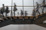 in article about seniors in college, a blurry photo of students walking on a walkway