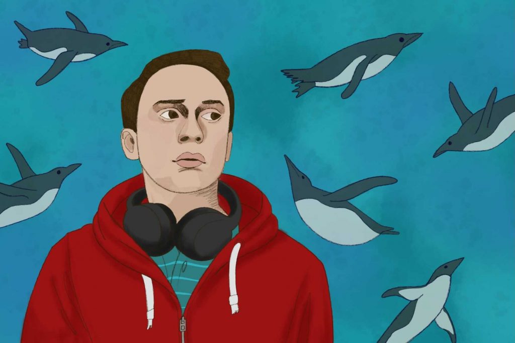 Sam from Atypical surrounded by penguins
