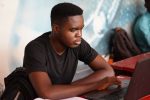 in article about working and studying, someone on a laptop