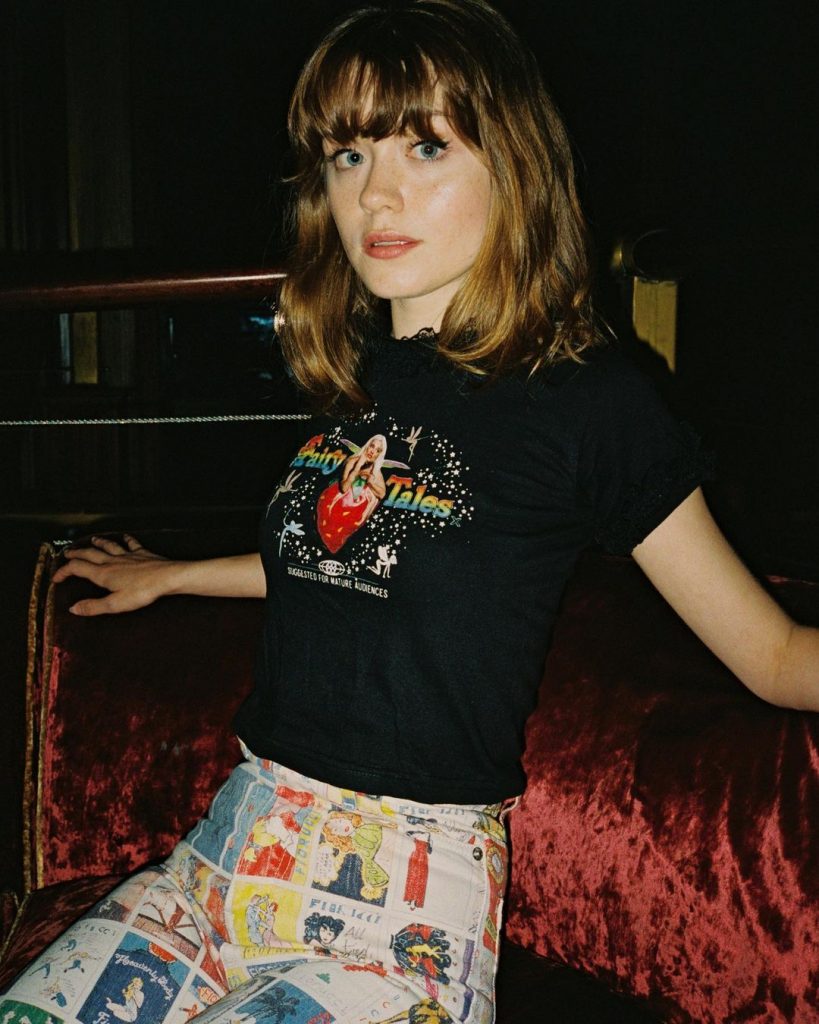In article about album You Signed Up for This, a photo of Maisie Peters