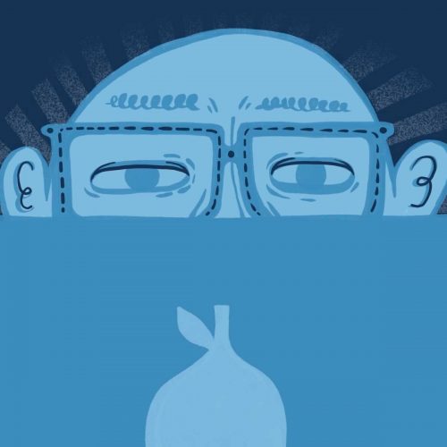 Illustration of person wearing blue light glasses while sitting in front of a laptop