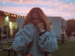 Chelsea Cutler wearing a sweater