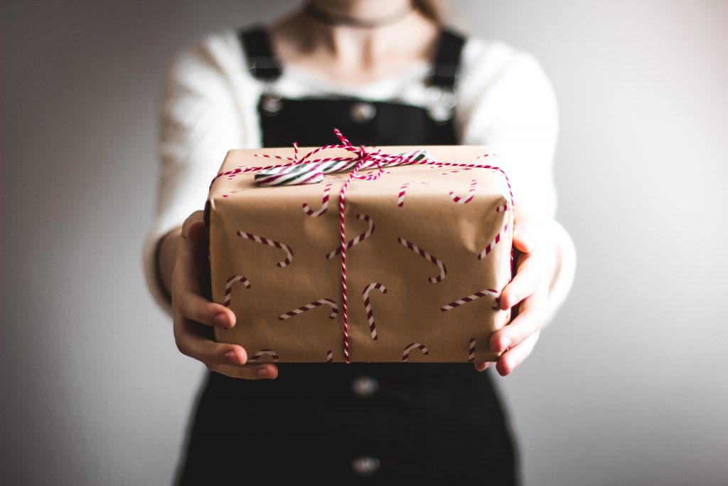A woman holding a gift