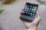 Person holding a BlackBerry phone