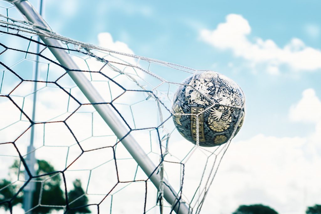 in article about ronaldo, a soccer ball in a goal