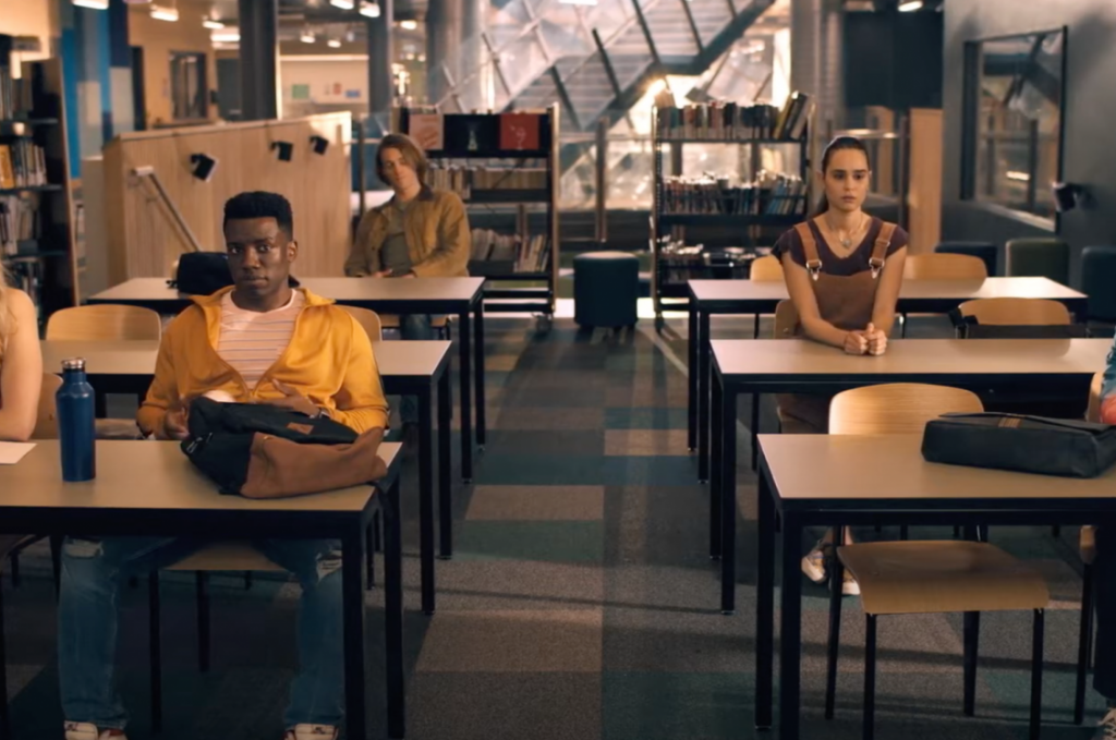 Scene from Peacock series One of us is Lying with main characters sitting in detention.