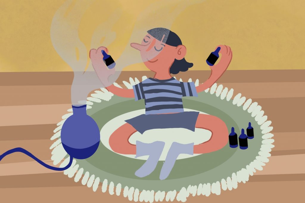 person sitting on rug doing aromatherapy