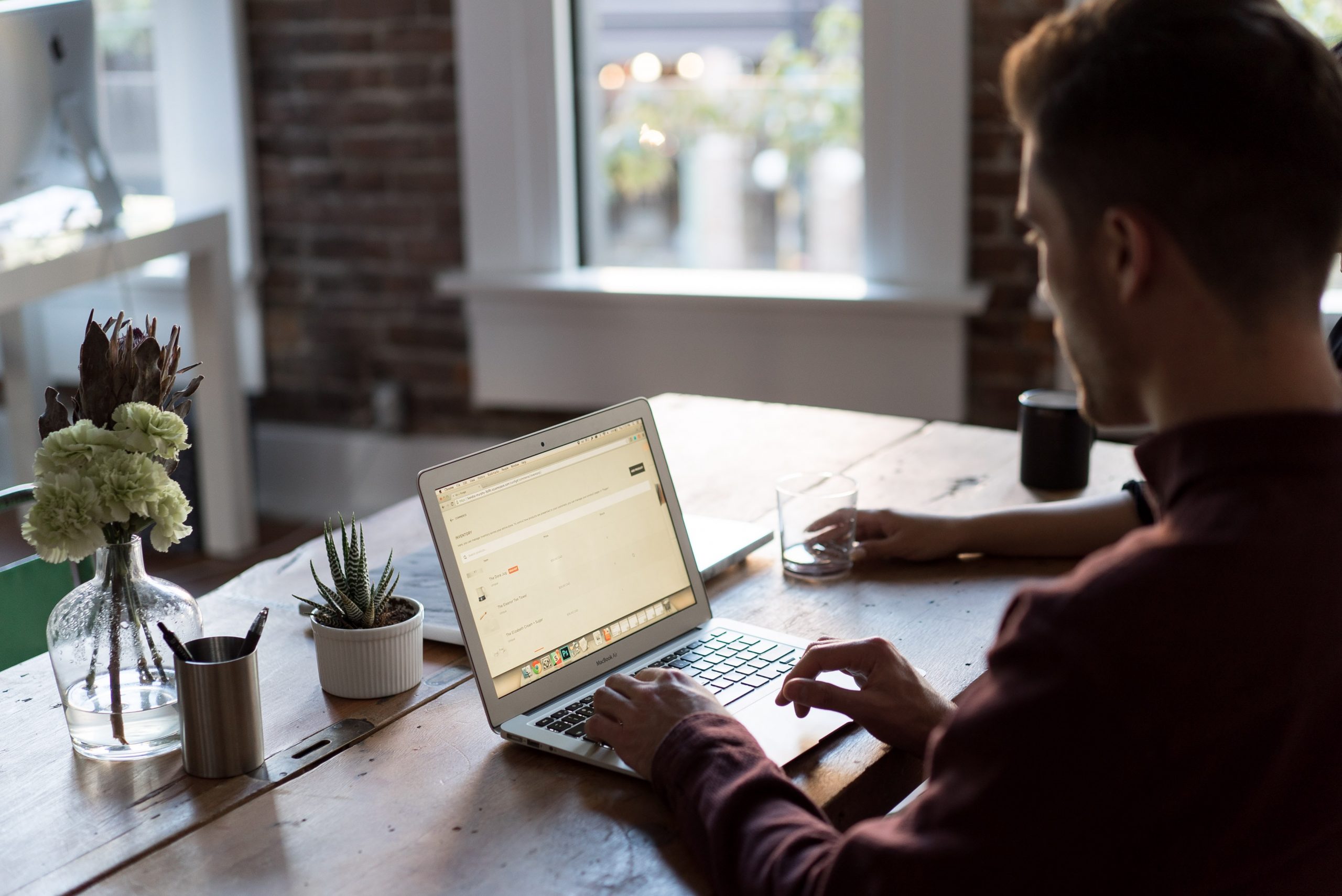 in article about evidence-based practice, a person studying on their laptop