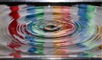 The LGBTQ+ flag reflection in Holy Water represents Hallmark's inclusion of LGBTQ content regardless of it being a Christian-owned network.