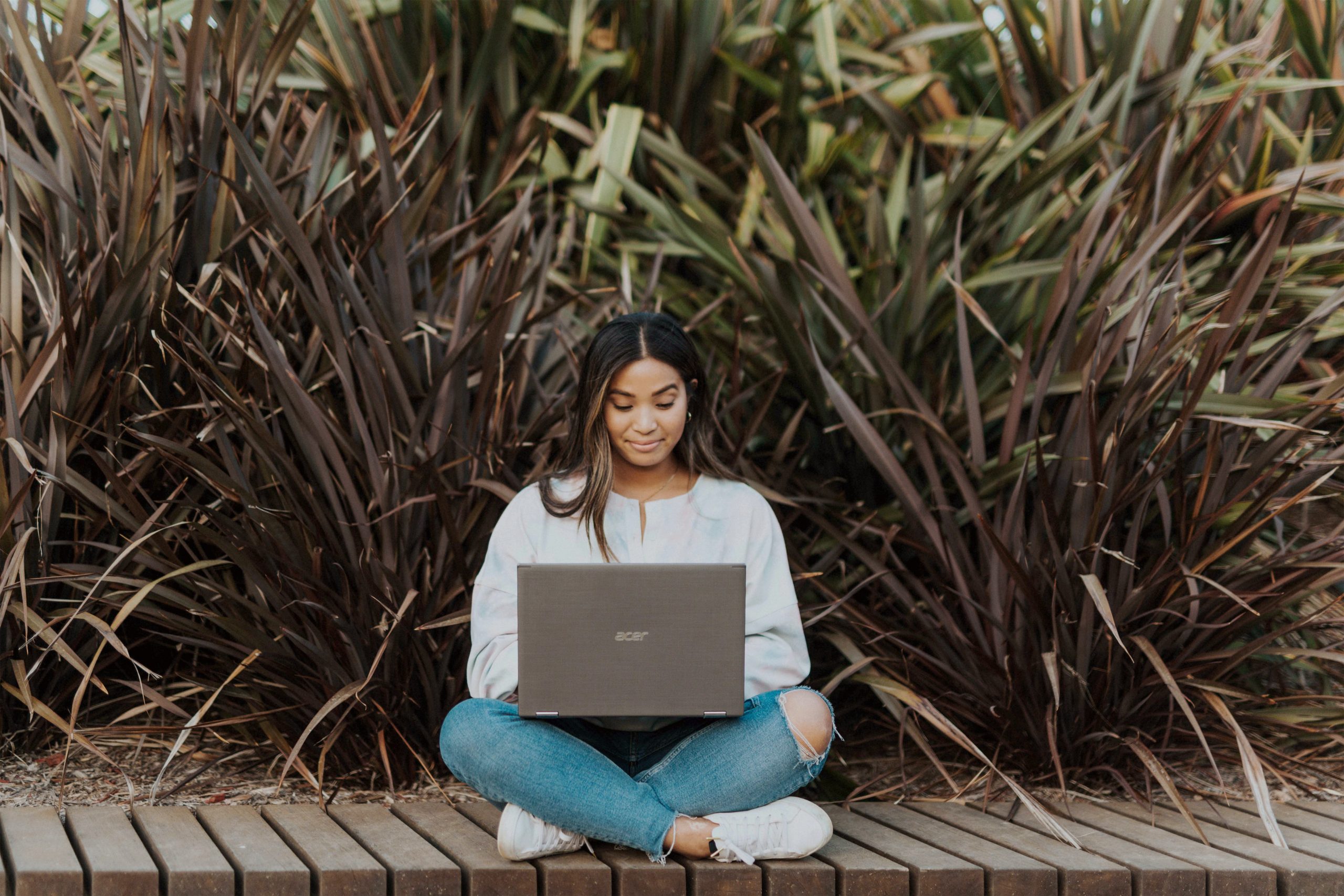 in an article about students who get injured, a person sitting down with their laptop