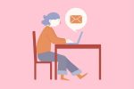girl sitting at computer practicing email etiquette