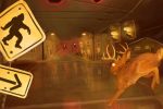 cryptid jumping into frame and sign pointing to bigfoot