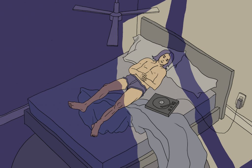 In an article about Drake's Honestly, Nevermind, career, a person lying on a bed listening to a record