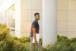 in an article about student loan debt, a person walking into a building