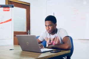 someone studying at a laptop