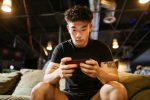 person mobile gaming