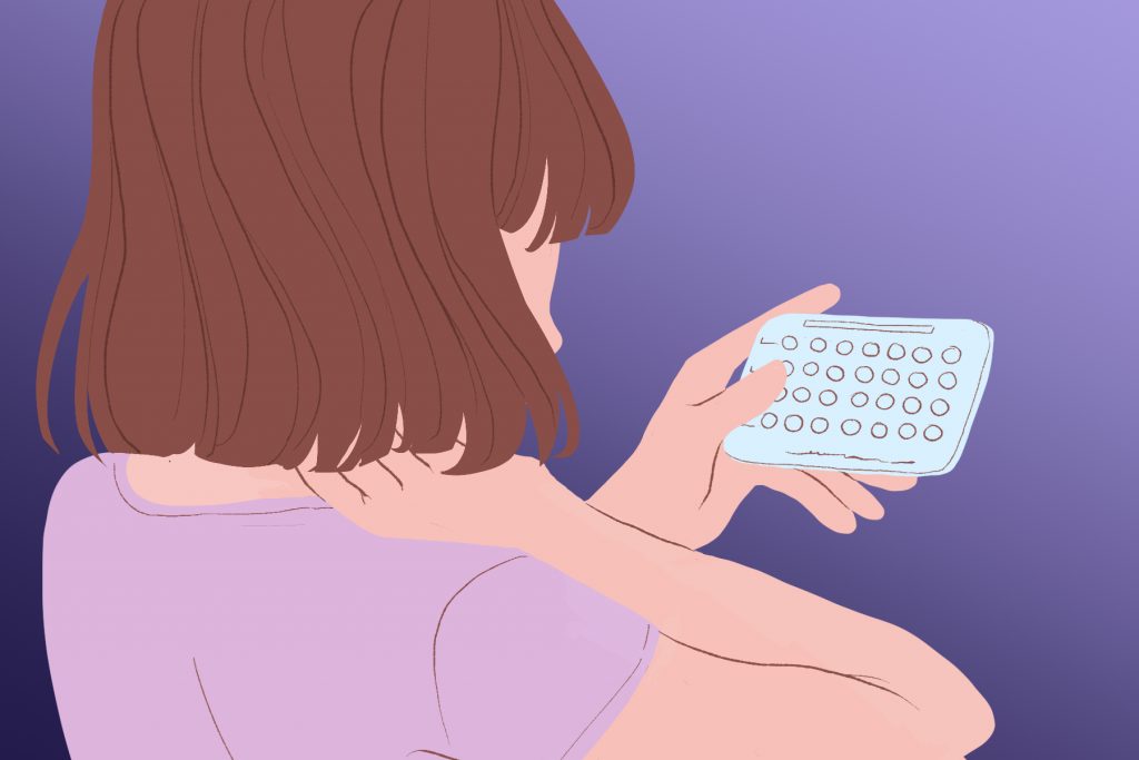 A woman taking hormonal birth control